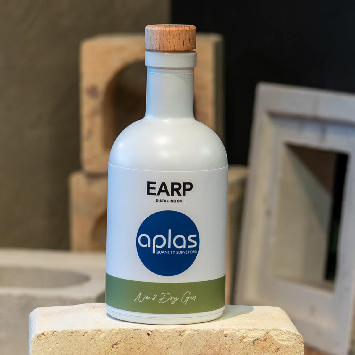 A 200mL Bottle of No. 8 Gin branded with Aplas Surveyors logo